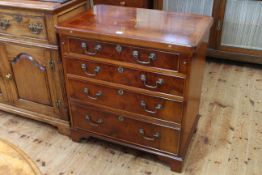Inlaid burr mahogany and mahogany four drawer fold top bachelors chest on bracket feet,
