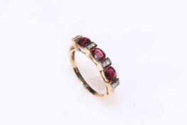 9k gold Malawi ruby and white sapphire ring, size N/O.