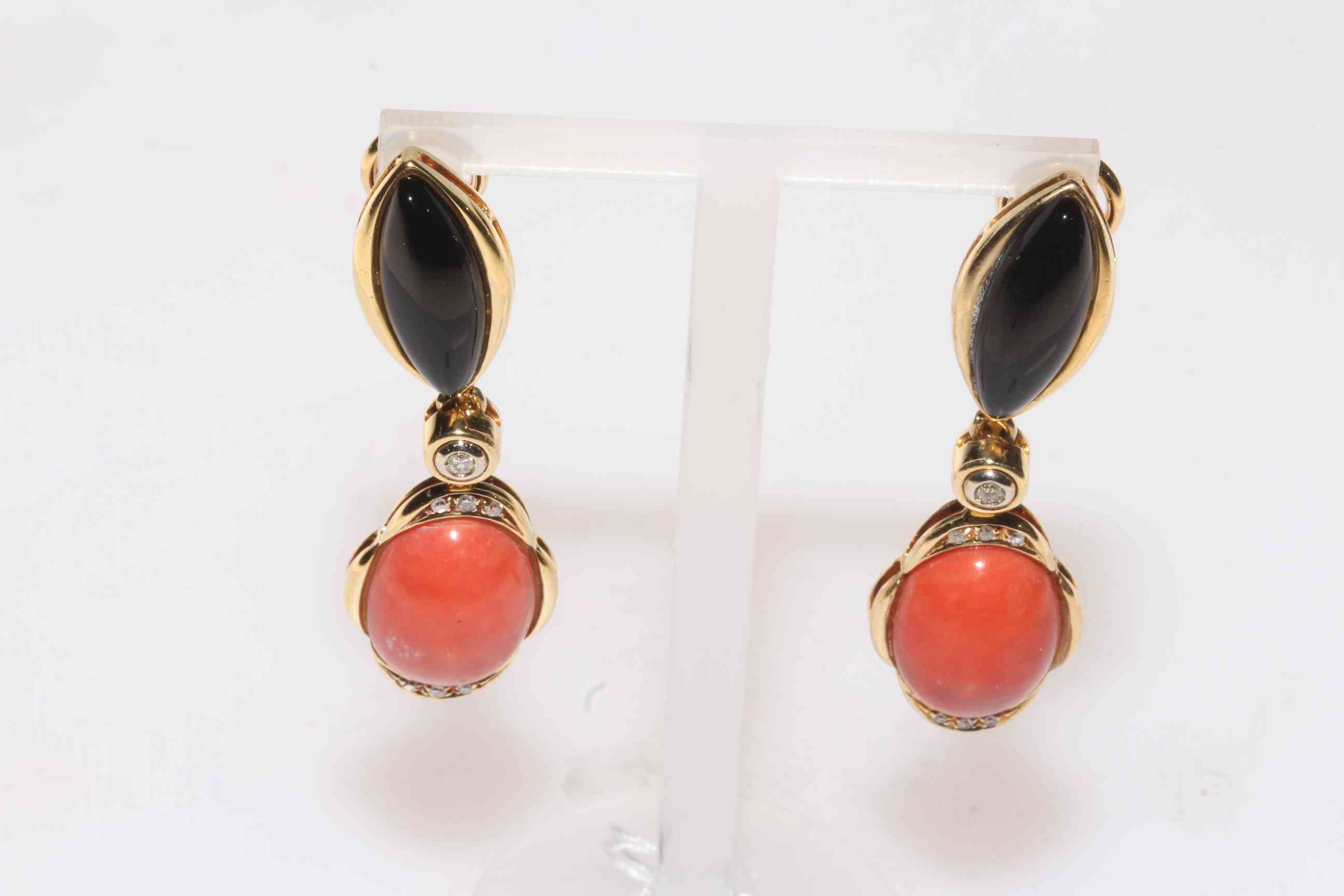 Pair 18 carat yellow gold, coral, black onyx and diamond drop earrings.