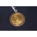 1915 Austria 4 Ducat gold coin in a 9k pendant mount.