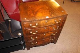 Mahogany four drawer bow front chest, lamp table and tinted glass entertainment unit (3).