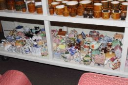 Large collection of novelty teapots.