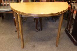 Oak demi lune fold top tea table with a mahogany inlaid centre,