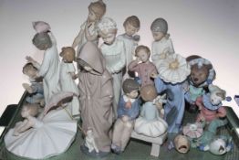 Collection of mostly Nao figures including clown and children figures (15 pieces).