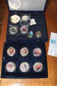 Large collection of gold plated and other coins, capsulated in presentation cases.