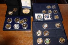 Collection of gold plated and other coins with military interest.