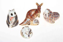 Four Royal Crown Derby paperweights, Walrus, Kangaroo, Field Mouse and Panda.