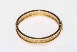 18 carat gold Roman numeral bracelet.