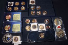 Assorted collection of gold plated and other coins with royalty, monarch interest.