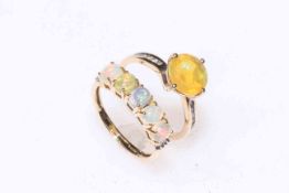 Two 9k gold opal rings.