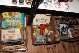 Three boxes of children's vintage toys, games, teddy bear and annuals.