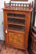 Late 19th/early 20th Century walnut glazed panel door music cabinet,