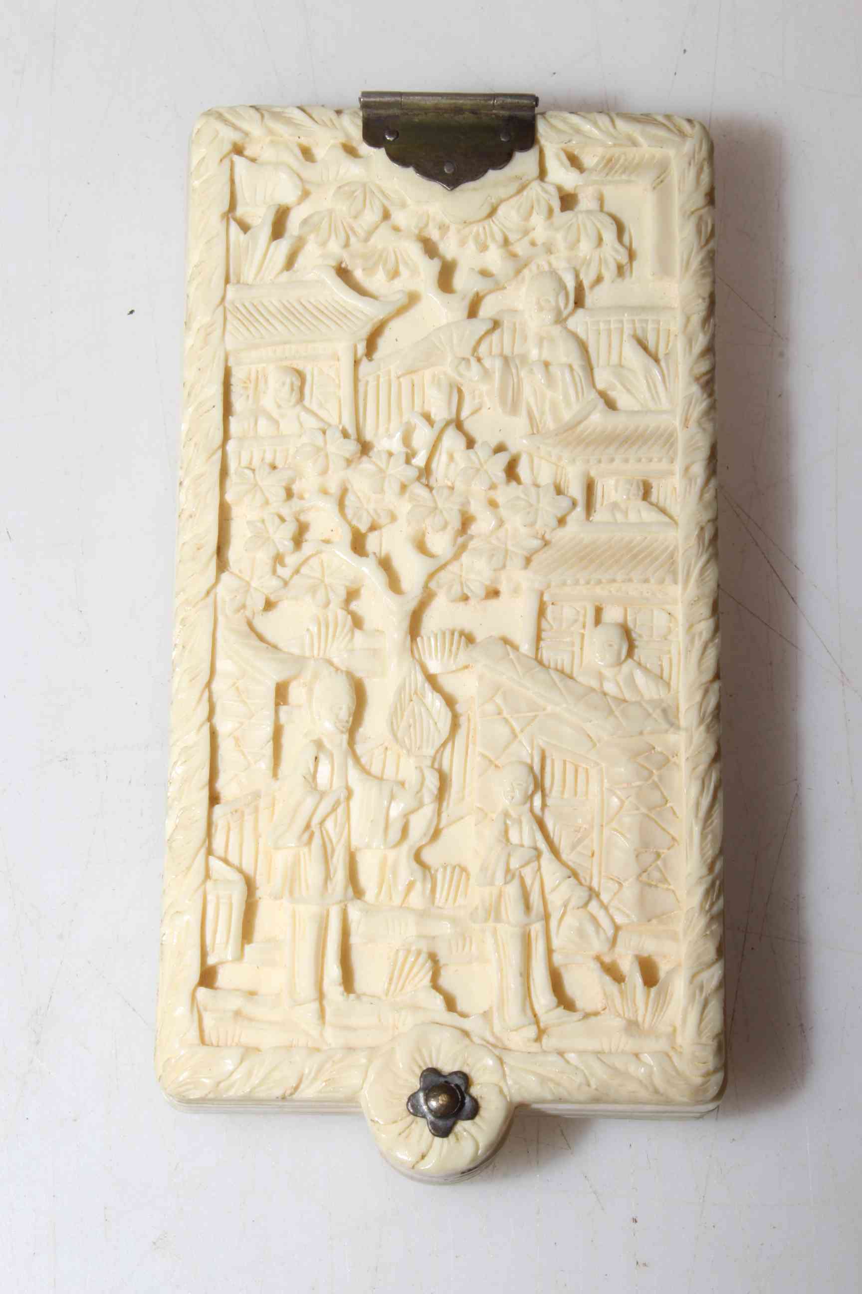 Antique Chinese carved ivory aide-mémoire.