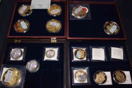 Collection of gold plated and other coins.