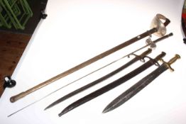 Collection of weaponry including a French model 1870 sword bayonet engraved St.