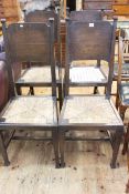 Set of four oak Arts & Crafts dining chairs in the manner of William Birch.