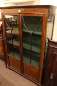 Edwardian mahogany two door vitrine and marble topped two drawer washstand.