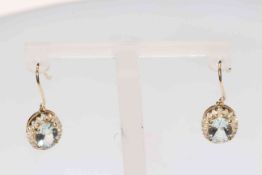 Pair 14 carat yellow gold, aquamarine and diamond earrings, with certificate.