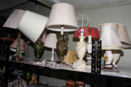 Collection of table lamps with shades.