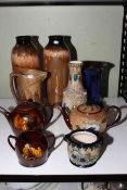 Nine pieces of art pottery.