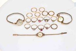 Collection of 22, 18 and 9 carat gold rings, and three bracelet watches.