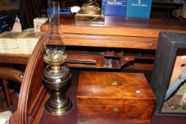 Victorian mahogany writing box and a brass oil lamp.