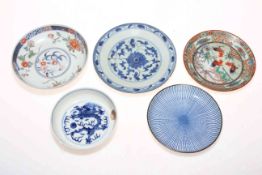 Collection of five Chinese shallow dishes.