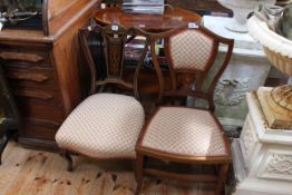 Inlaid mahogany oval occasional table and two Victorian/Edwardian nursing chairs (3).
