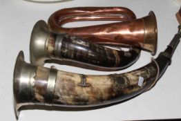 Copper and brass horn and two horn and white metal horns (3).