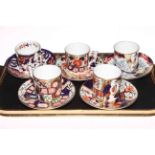 Five Royal Crown Derby 'Curators Collection' coffee cans and saucers.