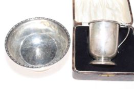 Boxed silver christening mug, Birmingham 1928, and a silver bowl (2).