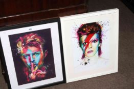 Two contemporary David Bowie prints.