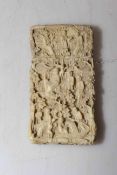 Finely carved Chinese antique ivory card case, 8cm by 4.5cm.