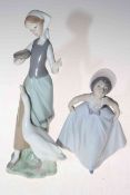 Lladro Girl with Duck, 23cm, and Daisy, 18cm, both boxed.