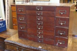 Early 20th Century sixteen drawer index cabinet, 45.5cm high by 60cm wide by 30cm deep.