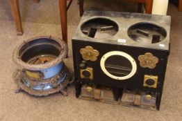 Two vintage paraffin stoves.