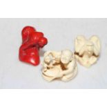 Small ivory okimono of a monkey trainer and two other pieces (3).