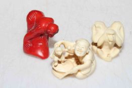 Small ivory okimono of a monkey trainer and two other pieces (3).