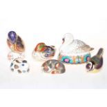 Six Royal Crown Derby paperweights including Kingfisher and Catnip Kitten.