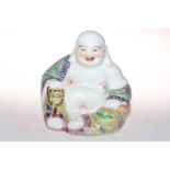 Chinese large laughing Buddha wearing colourful robe, impressed mark, 24cm.