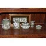 Six pieces of Wedgwood green Jasperware including plaque.