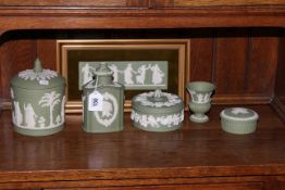 Six pieces of Wedgwood green Jasperware including plaque.