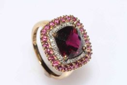 9 carat gold gem set ring, possibly pink tourmaline, diamond, size P.