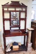 Late Victorian mahogany mirror backed hallstand, 220cm high by 99cm wide by 34cm deep.
