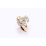Diamond set 18 carat gold ring, having two stones with sixteen in a border, size R.