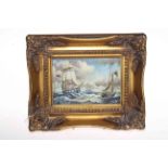 Small gilt framed decorative marine picture.