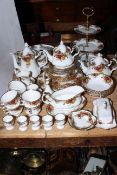 Royal Albert Country Roses including teapot, tureen, butter dish, approximately fifty pieces.