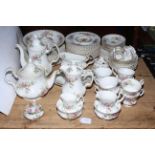 Royal Albert Moss Rose part tea and dinner service including teapots, gravy boat, napkin rings,