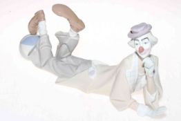 Lladro reclining clown with ball, 37cm length.