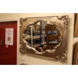 French style silvered framed wall mirror, 100cm by 74cm overall.